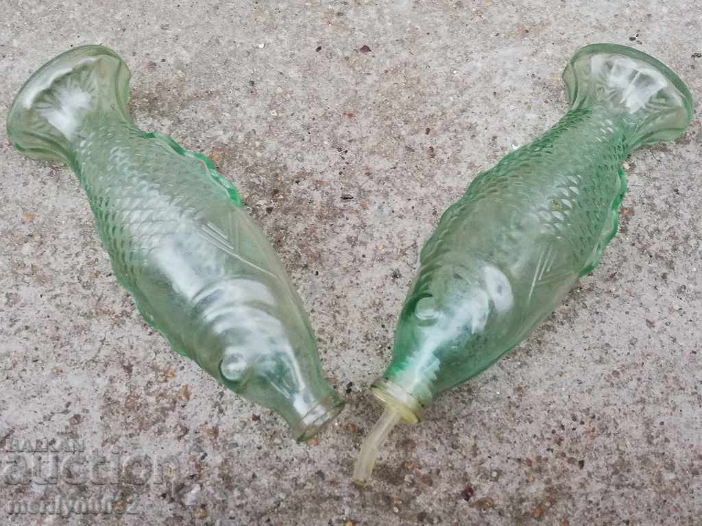 Delivery of Bottles of fish shaped bottle bottle of olive oil vinegar Delivery of Bottles of fish shaped bottle bottle of olive oil vinegar