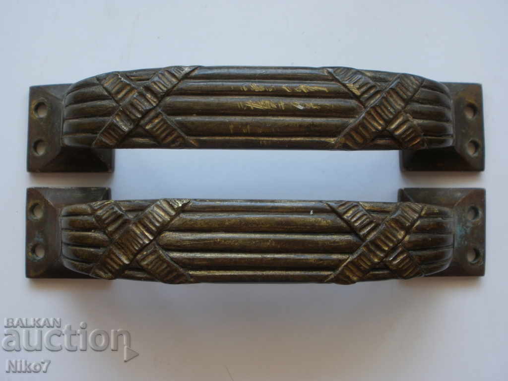 Set of old solid bronze handles. Set of old solid bronze handles.