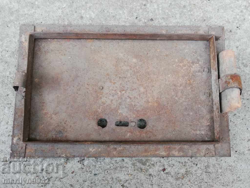 Delivery of Detail door of an old stove jamal lid fireplace Delivery of Detail door of an old stove jamal lid fireplace
