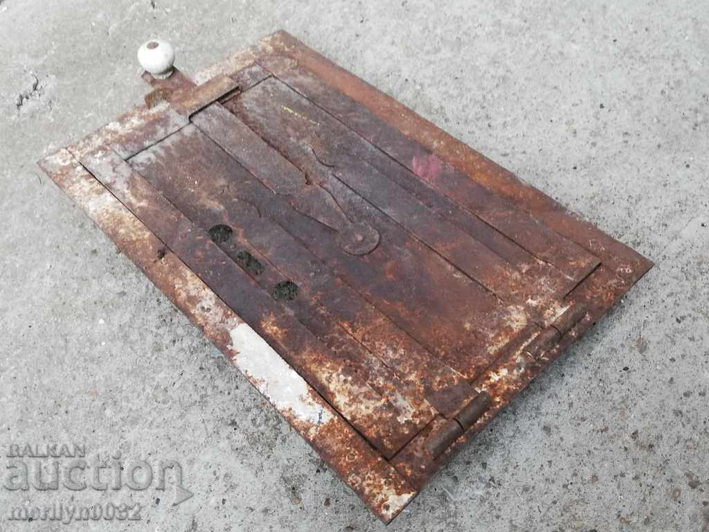 Detail door of an old stove jamal lid fireplace - 5 Detail door of an old stove jamal lid fireplace - 5