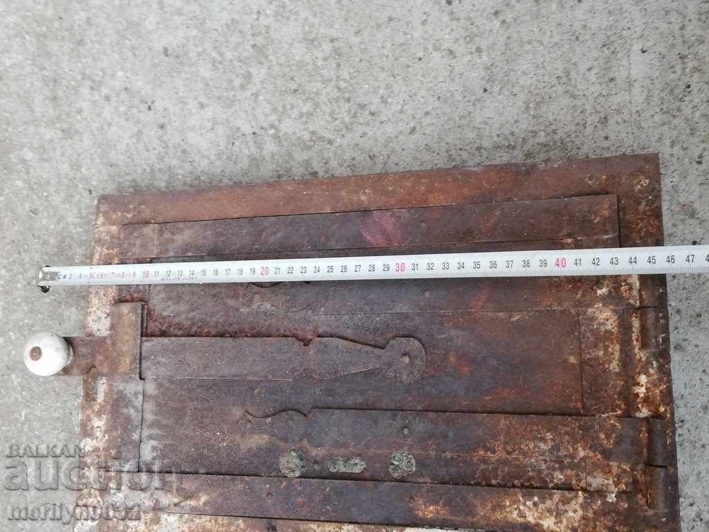 Detail door of an old stove jamal lid fireplace - 6 Detail door of an old stove jamal lid fireplace - 6