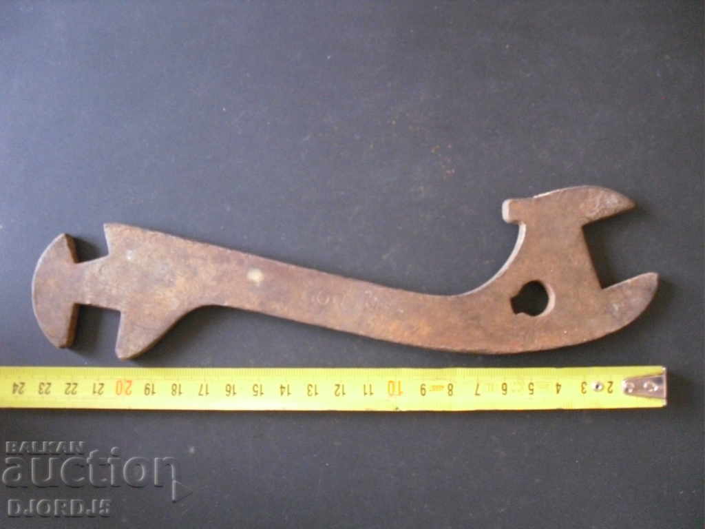 Old key, marking with price ~2.57 €