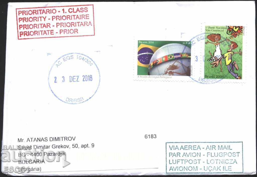 Traveled envelope with 2004 stamps, Flags 2014 from Brazil