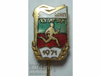 26250 Insigna din Bulgaria MNP Ediția Națională Iluminarea Jocurilor XX 1971-