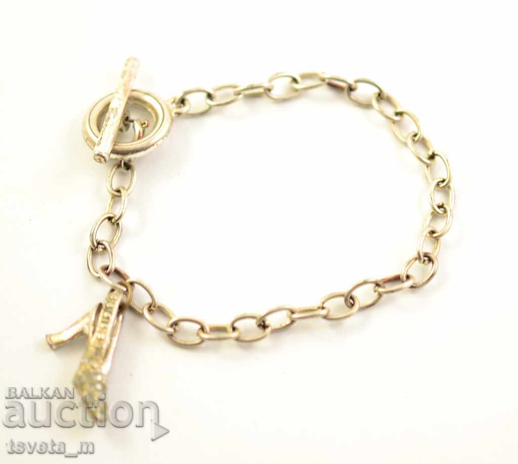 Hryvnia with a talisman