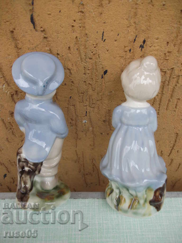 Auction  Lot of 2 pcs. porcelain figures "boy and girl"