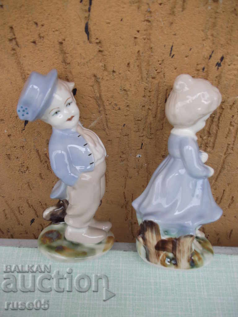 Delivery of Lot of 2 pcs. porcelain figures "boy and girl"