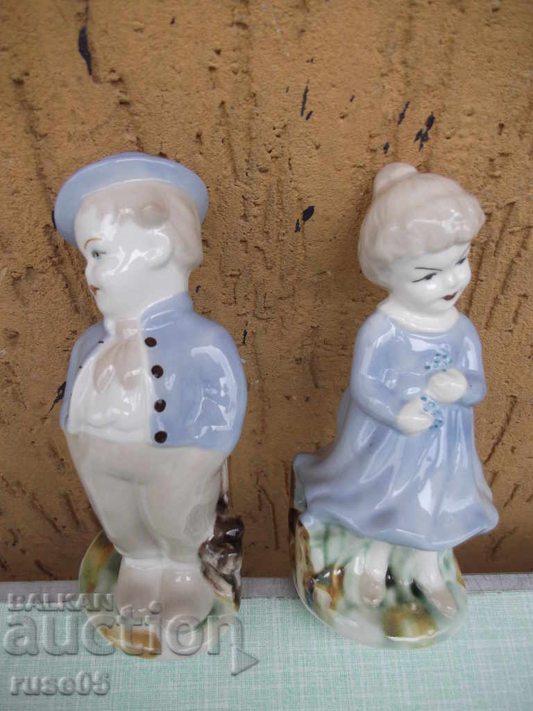 Lot of 2 pcs. porcelain figures "boy and girl"