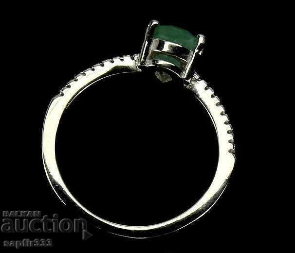 Auction LUXURY RING WITH NATURAL EMERALD AND ZIRCONIA Auction LUXURY RING WITH NATURAL EMERALD AND ZIRCONIA