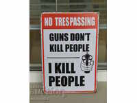 Metal plate inscription Guns don't kill I kill danger