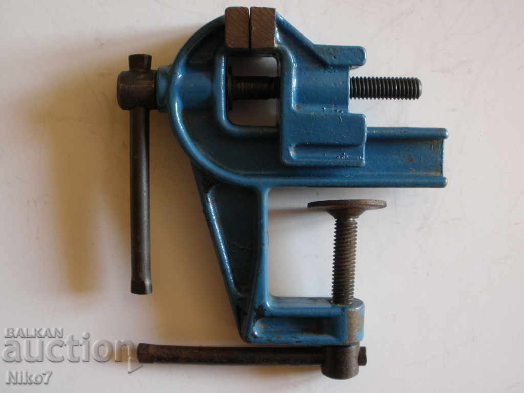 A small old jeweler's vise from the soca. A small old jeweler's vise from the soca.