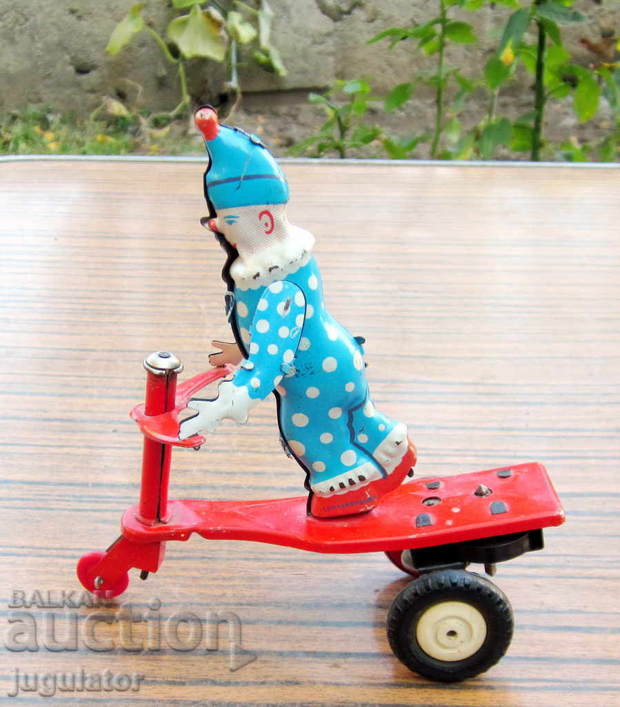 old marked metal tin mechanical clown toy