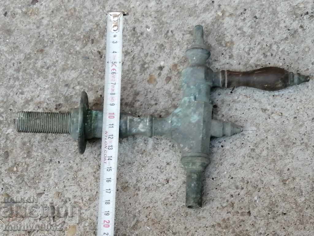 Delivery of Old bronze beer barrel tap