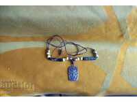 Silver necklace, string