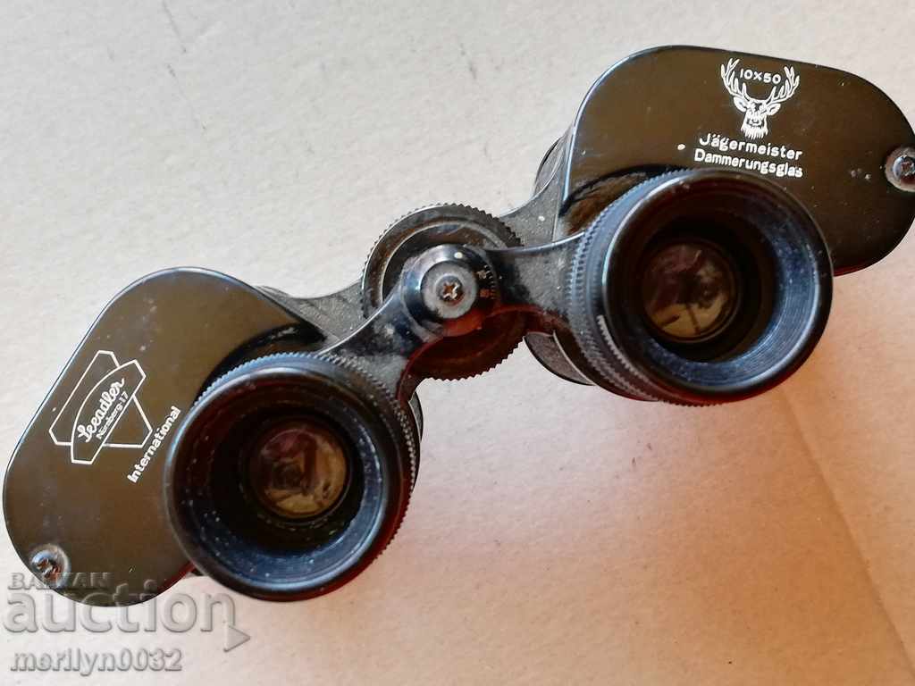 Livrarea Binoclu vechi german de vânătoare 10/50 cu carcasă pentru binoclu