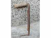 Old rusty wrought iron tool