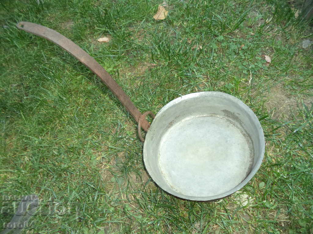 A deep Renaissance forged frying pan