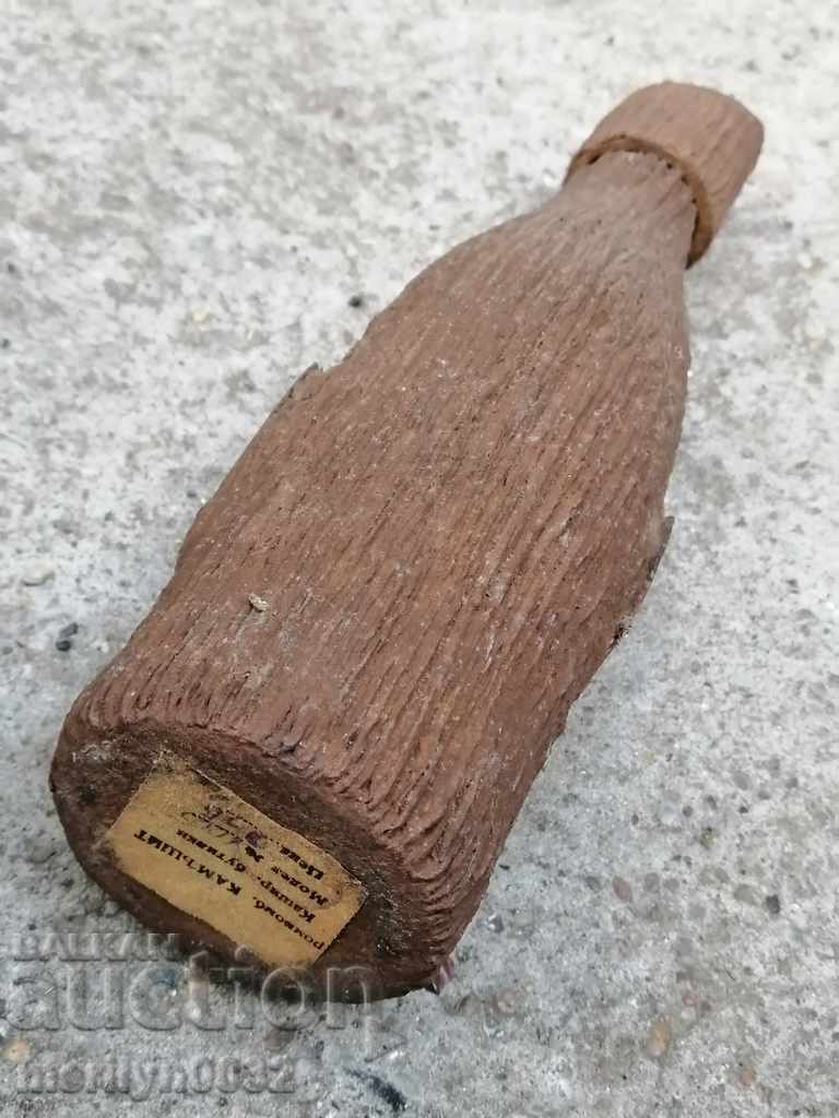 Auction  A lined bottle with a bottle labeled beer