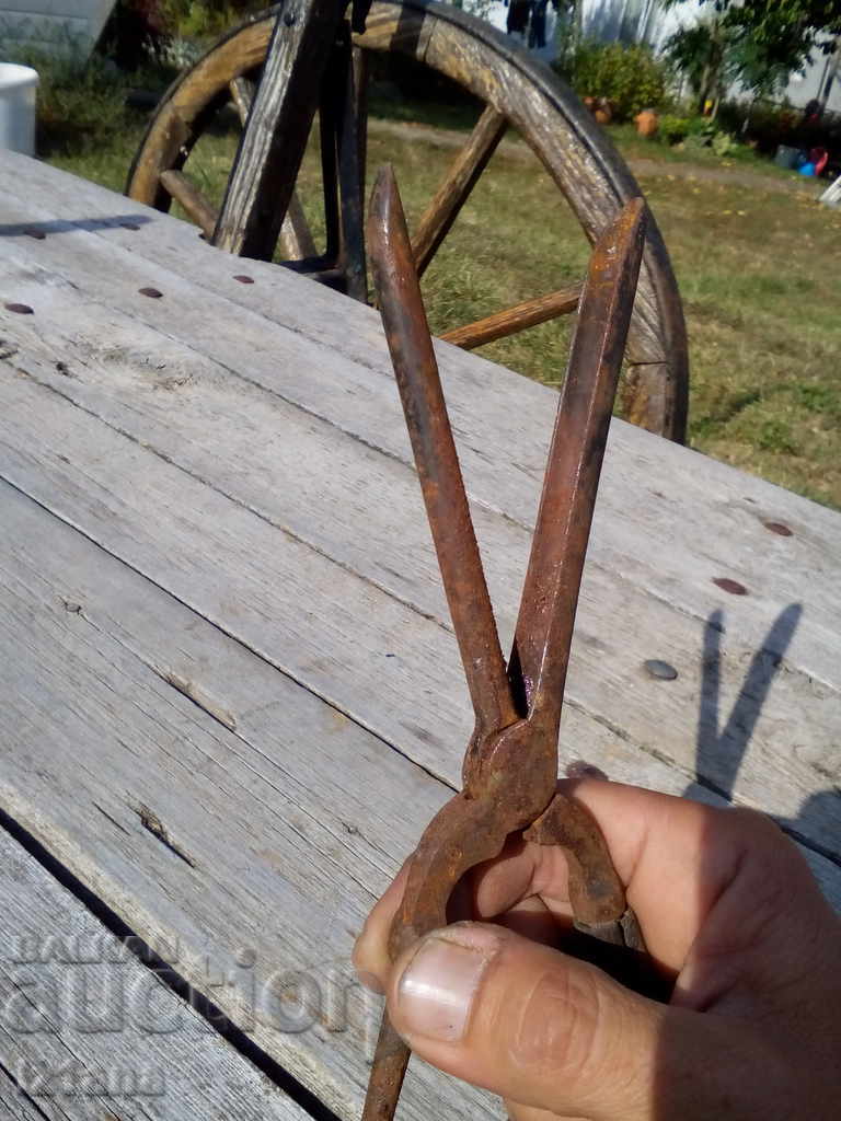 Delivery of Antique curling iron Delivery of Antique curling iron