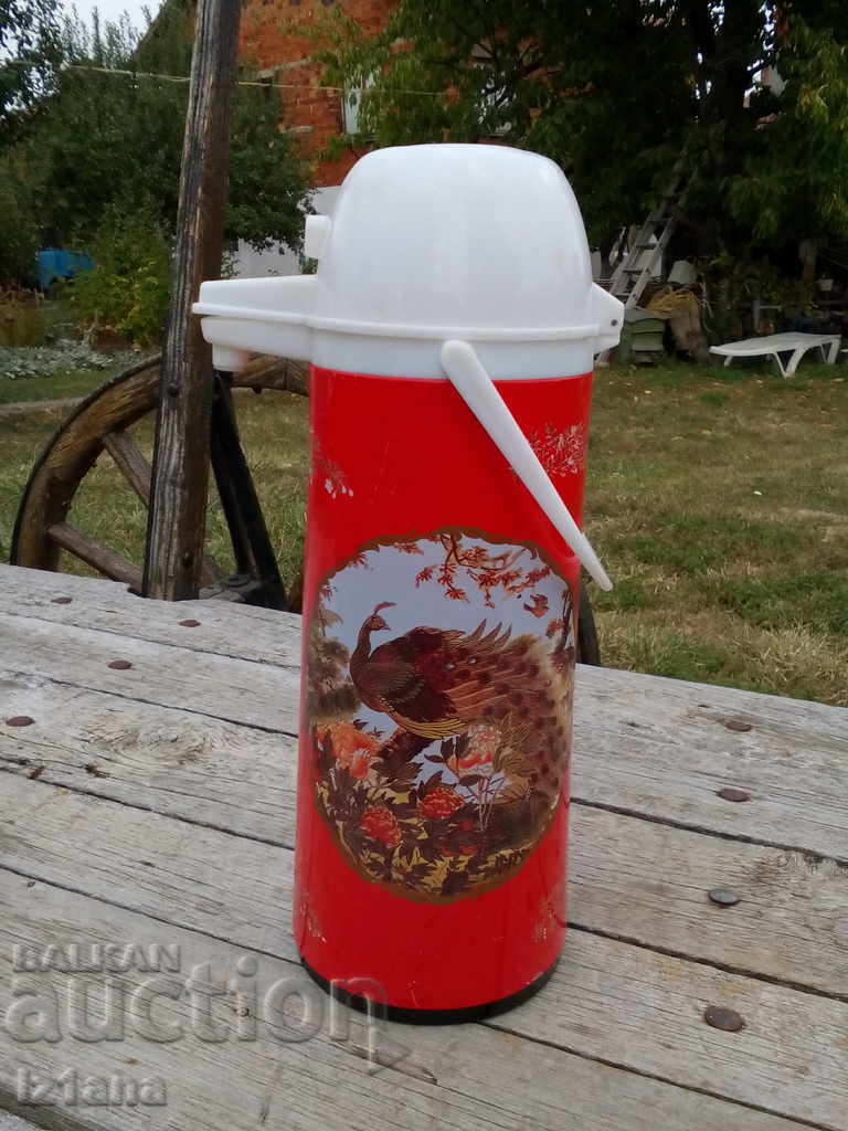 Auction  An old thermos