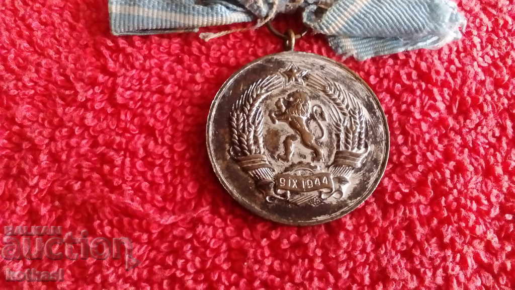 Delivery of Old Social Medal with ribbon for a mother of many children Delivery of Old Social Medal with ribbon for a mother of many children