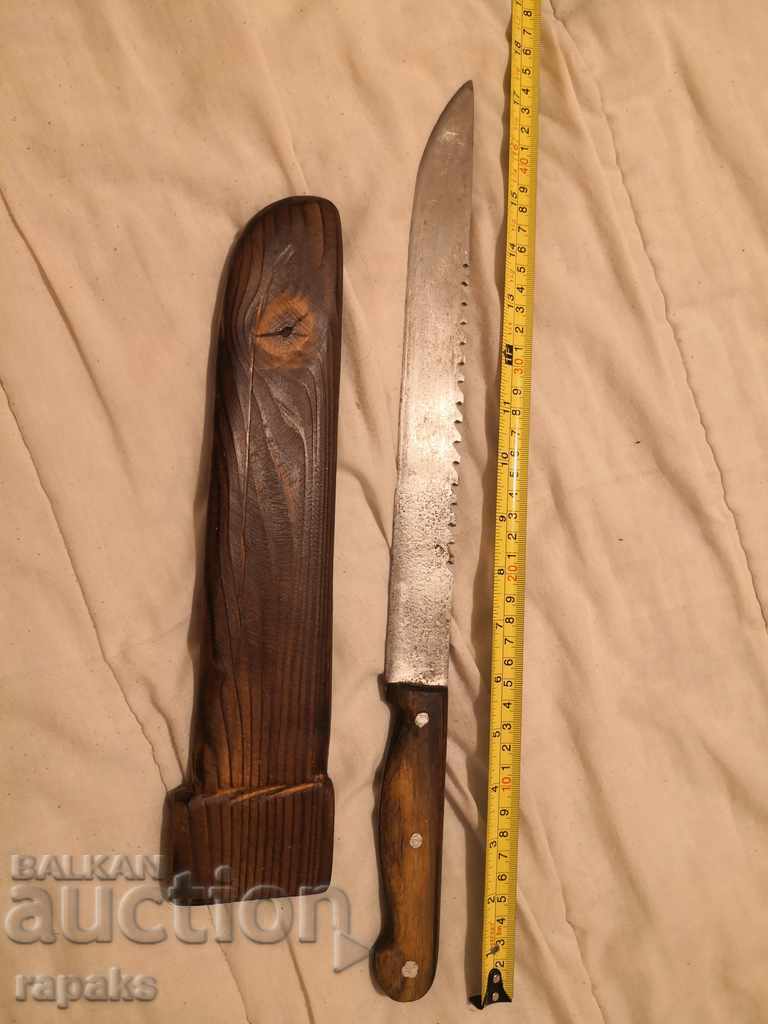 Delivery of A huge massive knife. Big and heavy like a sword, machete Delivery of A huge massive knife. Big and heavy like a sword, machete