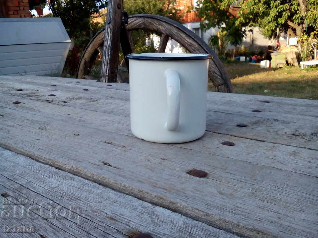 Delivery of Old enameled jug, cup