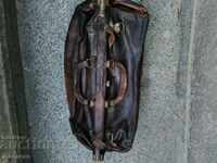 Old leather bag with metal elements