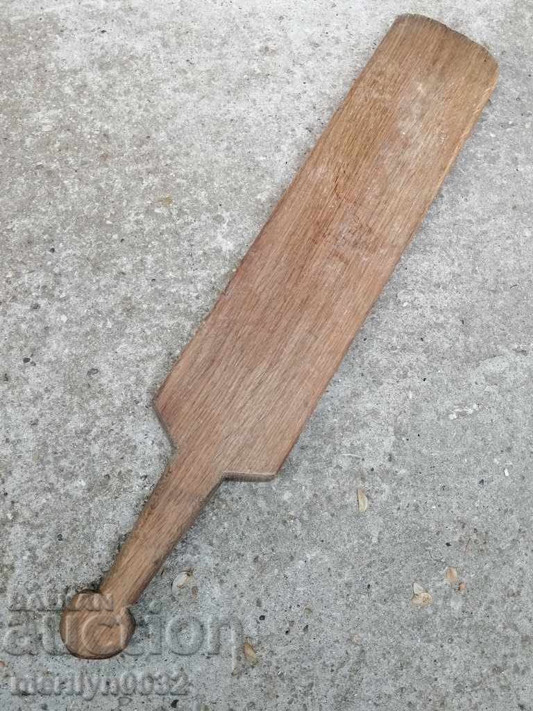 Old wooden tupalka, bat of wood, wooden