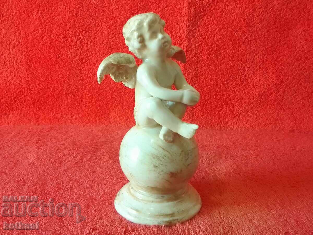 Old Porcelain Figure of an Angel Sitting on a Ball with price 125.50 BGN | € 64.17 Old Porcelain Figure of an Angel Sitting on a Ball with price 125.50 BGN | € 64.17