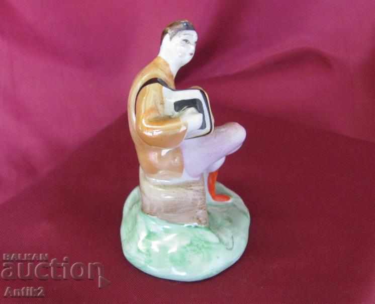 Auction  Old Porcelain Figure Musician Russia