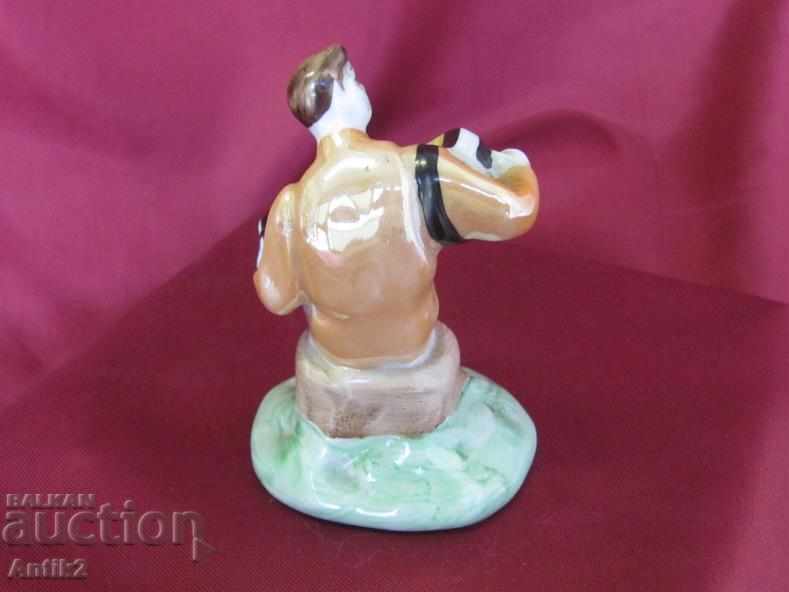 Delivery of Old Porcelain Figure Musician Russia