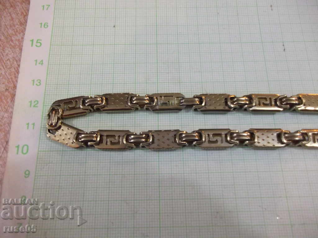 Singing yellow with crucifix imitation jewelry - 92 gr. with price 30.00 BGN | € 15.34 Singing yellow with crucifix imitation jewelry - 92 gr. with price 30.00 BGN | € 15.34