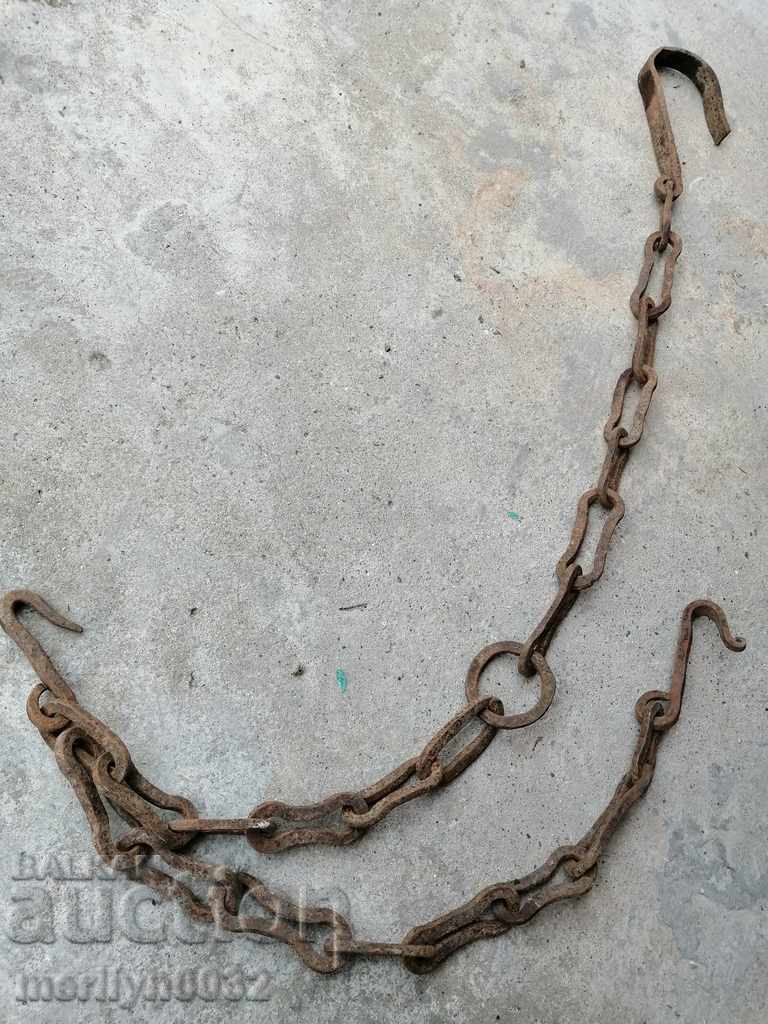 Old forged chain with hook, hearth for hearth chain hook