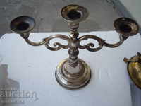 Old beautiful candlestick with markings.