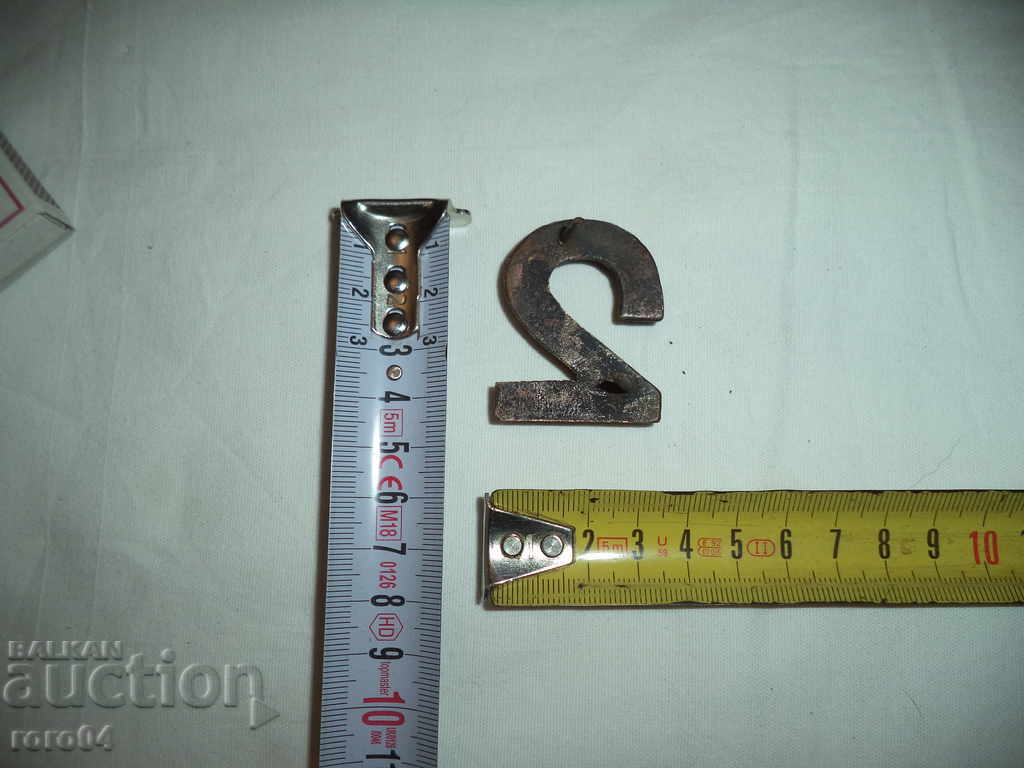 Auction  BRONZE NUMBER