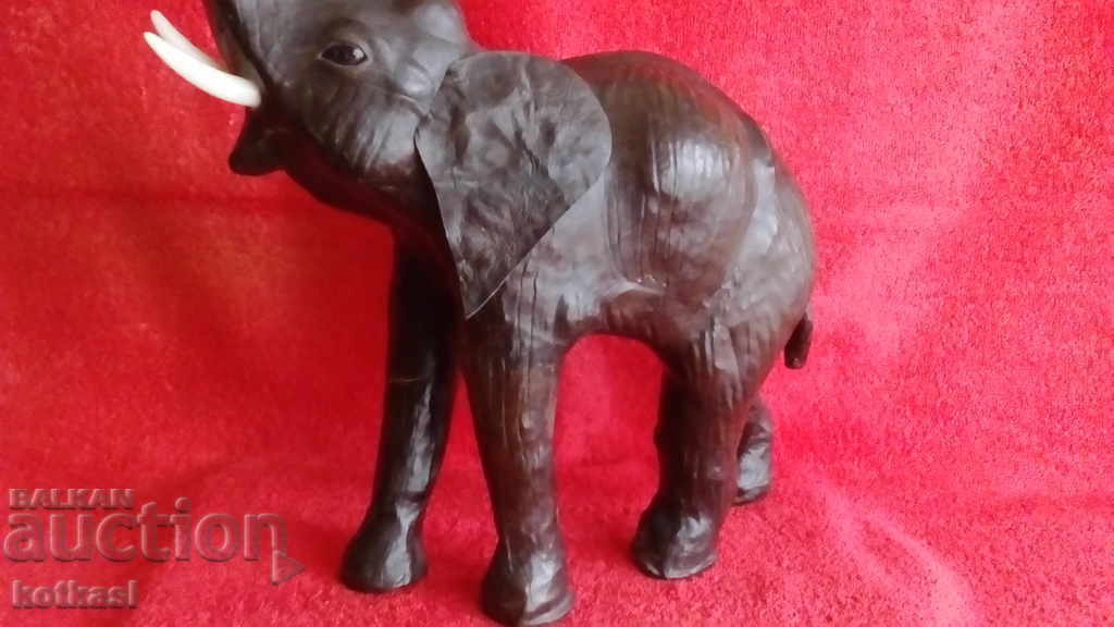 Delivery of Old figure of an Elephant, height 35 cm. Wood, Leather Delivery of Old figure of an Elephant, height 35 cm. Wood, Leather