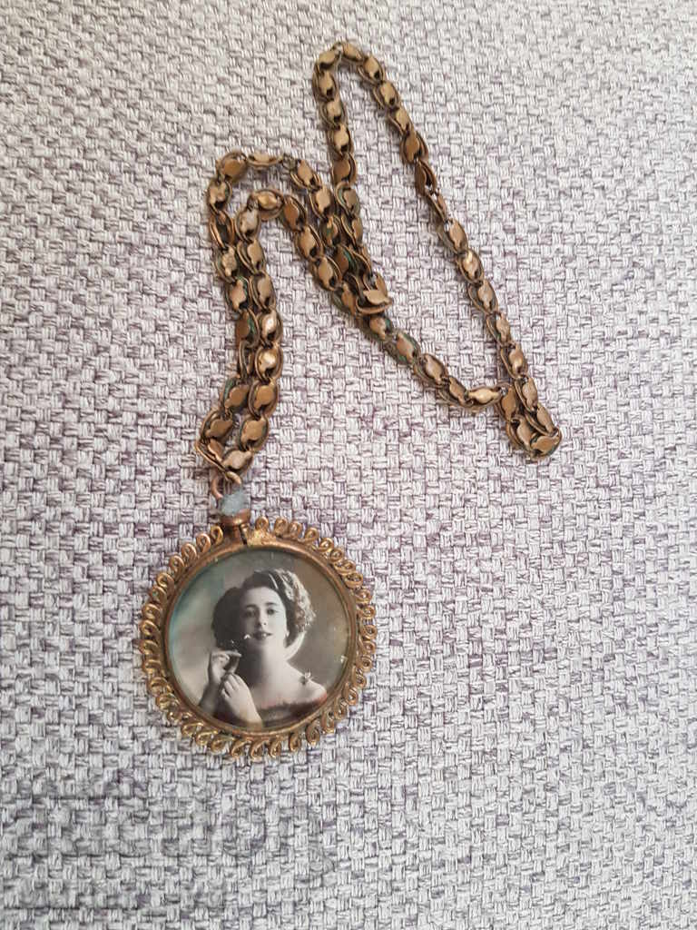 Auction  Old double-faced medallion