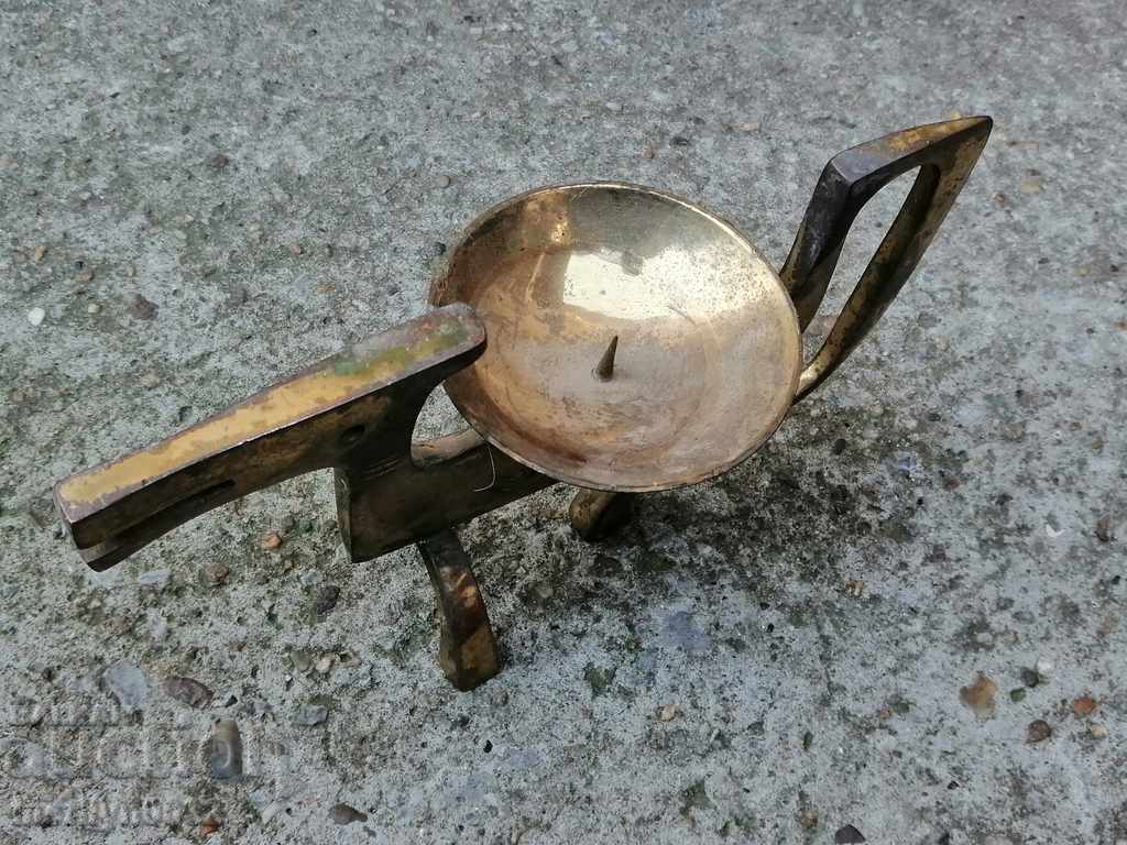 Auction  Old brass candlestick with figure