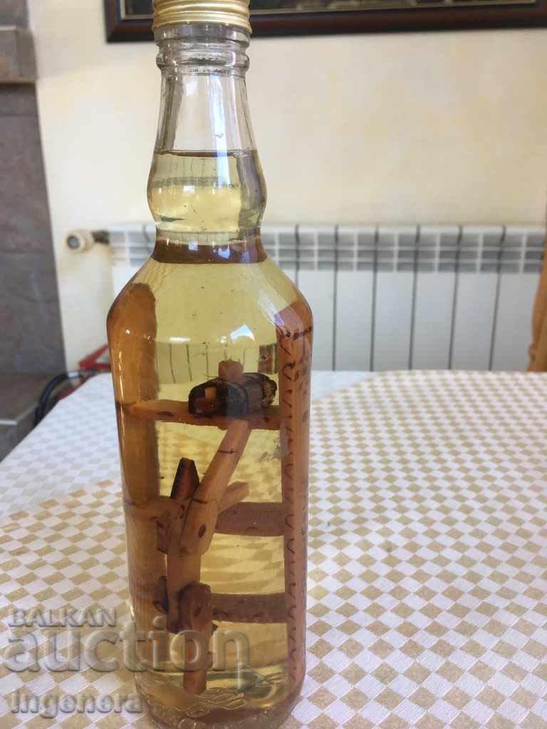 Delivery of RAKIYA BOTTLE WITH WOOD COMPOSITION