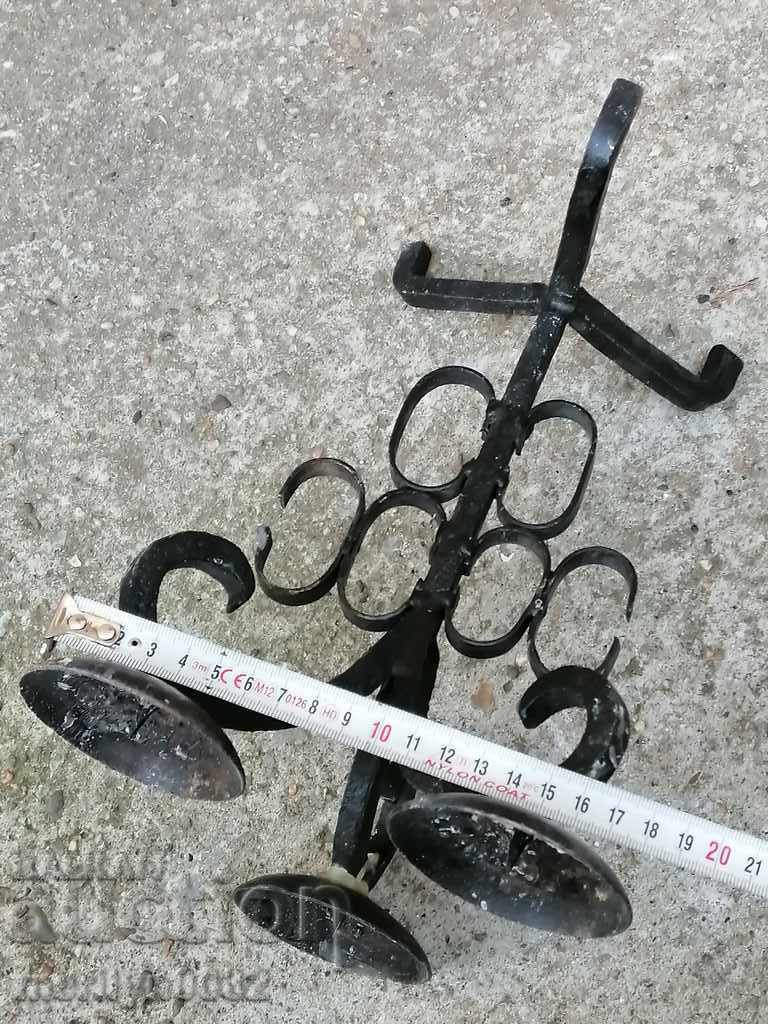 Delivery of Old wrought iron candlestick Delivery of Old wrought iron candlestick