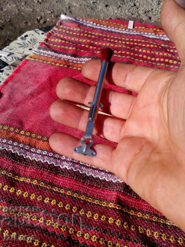 Auction An old tool for catching stitches Auction An old tool for catching stitches