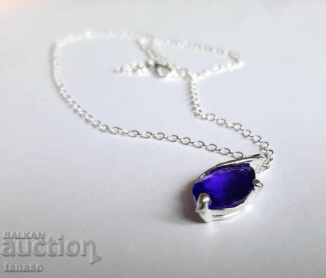 Silver necklace with purple crystal