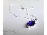 Silver necklace with purple crystal