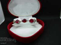 Silver bracelet with rubies