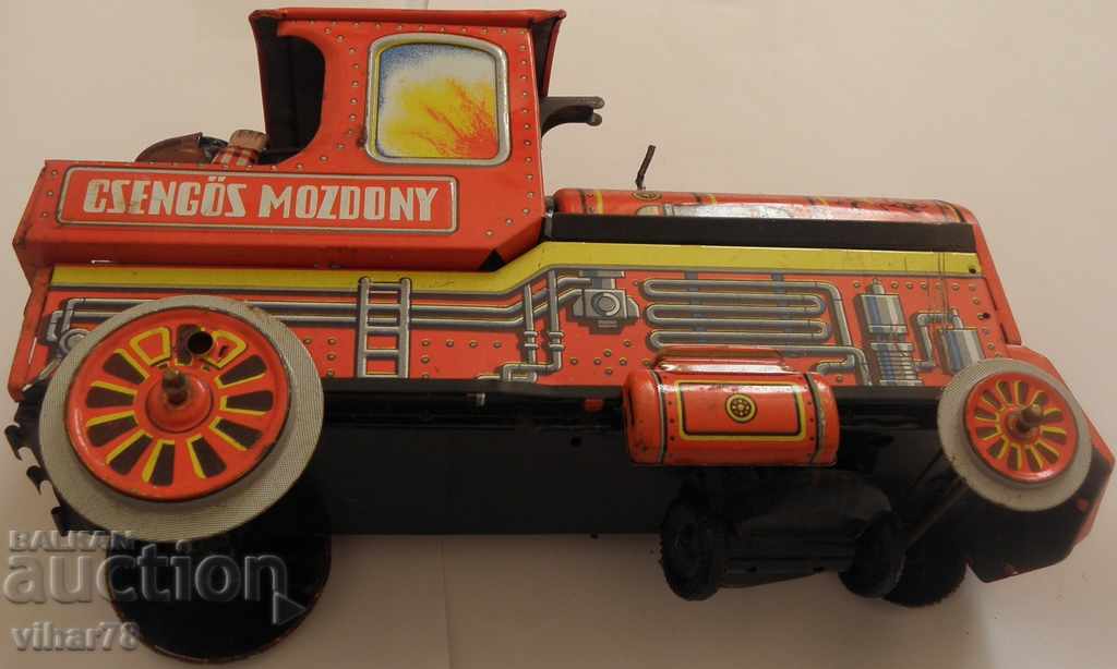 Auction an old tin toy Auction an old tin toy