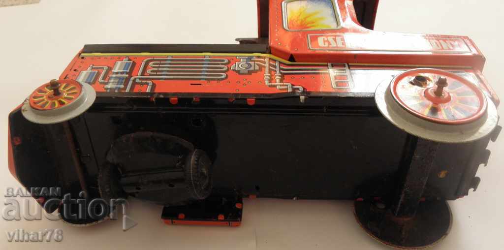 Delivery of an old tin toy Delivery of an old tin toy