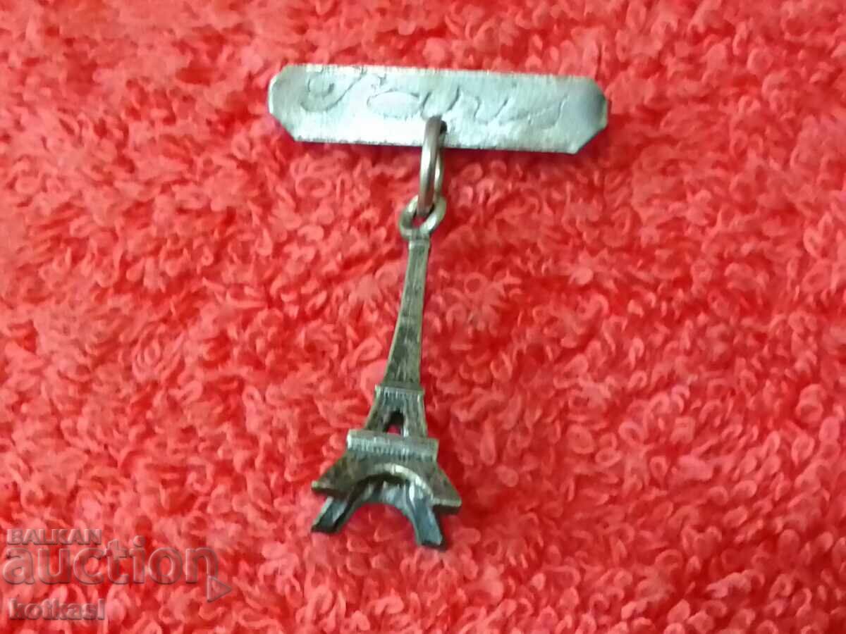 Delivery of Old badge carrier France capital Paris Eiffel Tower