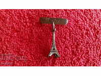 Old porter badge France capital Paris Eiffel Tower