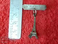 Old badge carrier France capital Paris Eiffel Tower